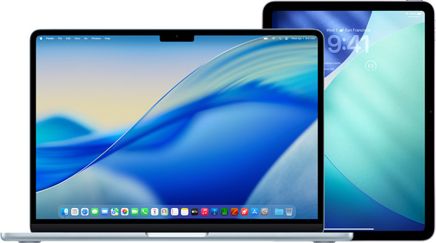 MacBook on left, iPad on right, screens displaying similar blue and green wallpaper.