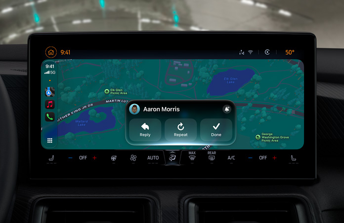 A CarPlay screen showing a Messages notification, with Maps visible in the background