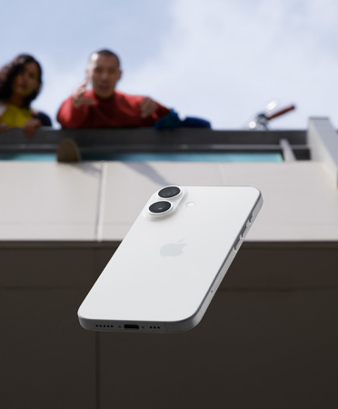 An iPhone 17 in White colour drops from someone’s hands