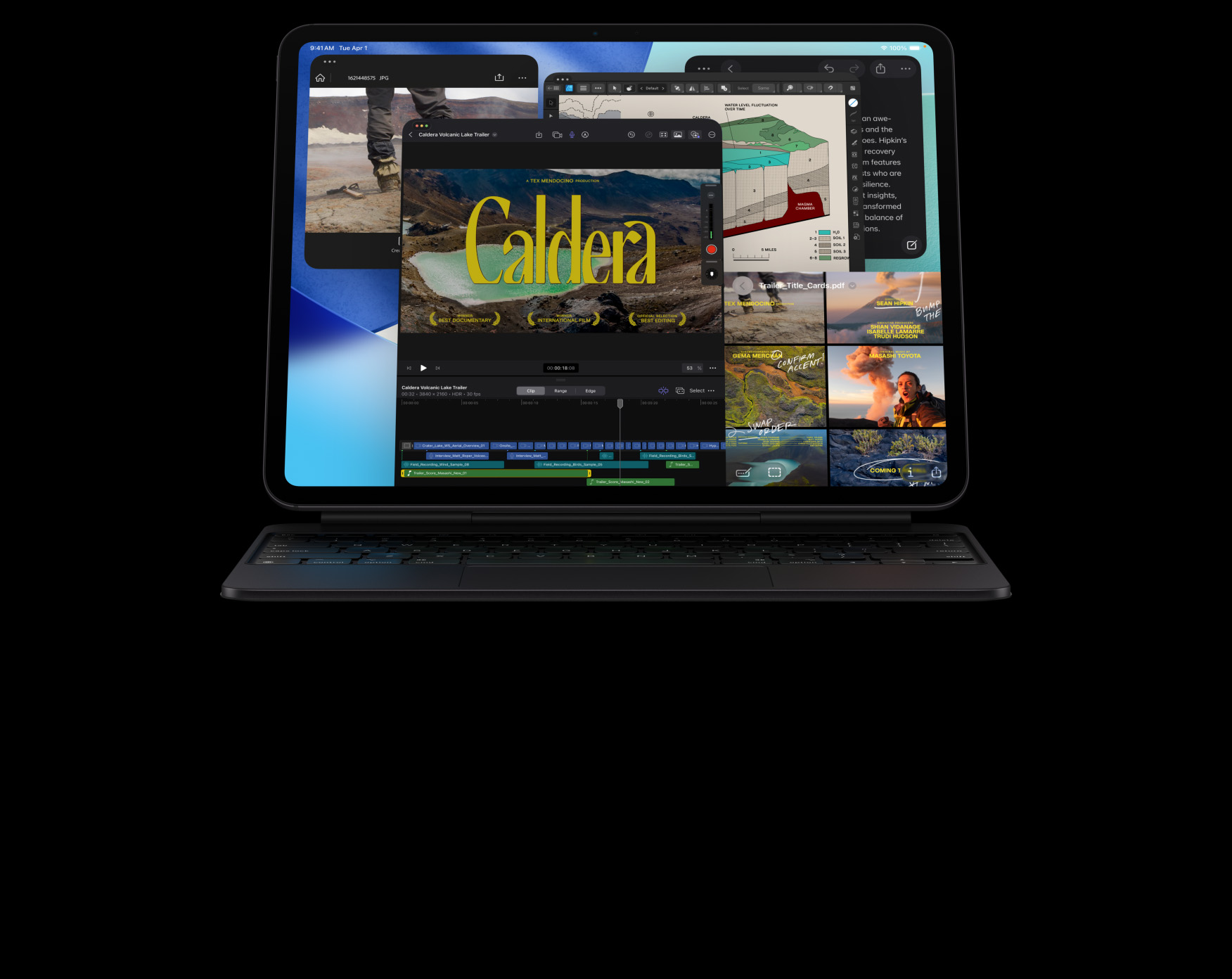iPad Pro, pohľad spredu, orientácia na šírku, kozmická čierna farba, pripojený ku kozmicky čiernej klávesnici Magic Keyboard, displej s oknami rôznych apiek: Final Cut Pro s časovou osou a rôznymi funkciami na úpravu videa, Mapy, Poznámky, mediálne klipy
