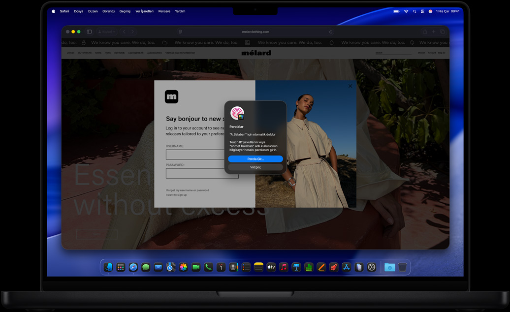 Bir kullanıcının Safari’de gezinirken bir web sitesine giriş yapmak için Touch ID kullanma bildirimi aldığı görülüyor