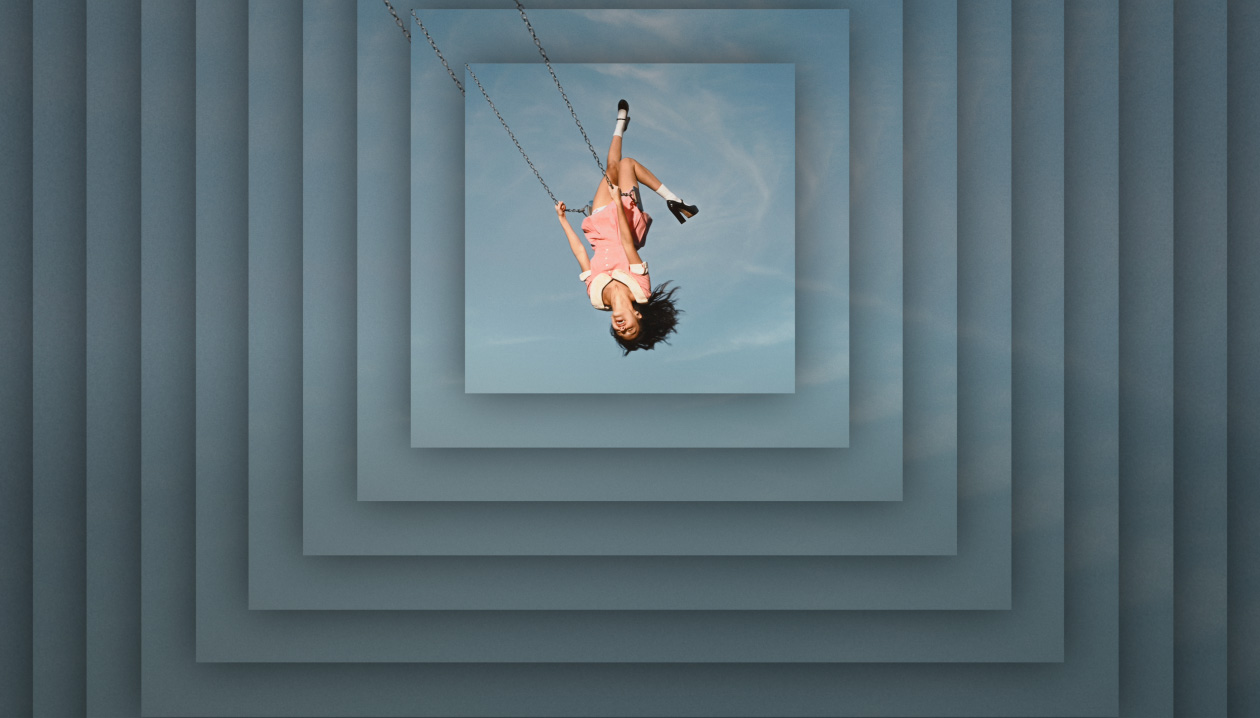 Olivia Rodrigo album "you seem pretty sad for a girl so in love" cover art features Olivia Rodrigo swinging from a swing set upside down against a cloudy sky. The album cover is repeated and layered on top of each other.