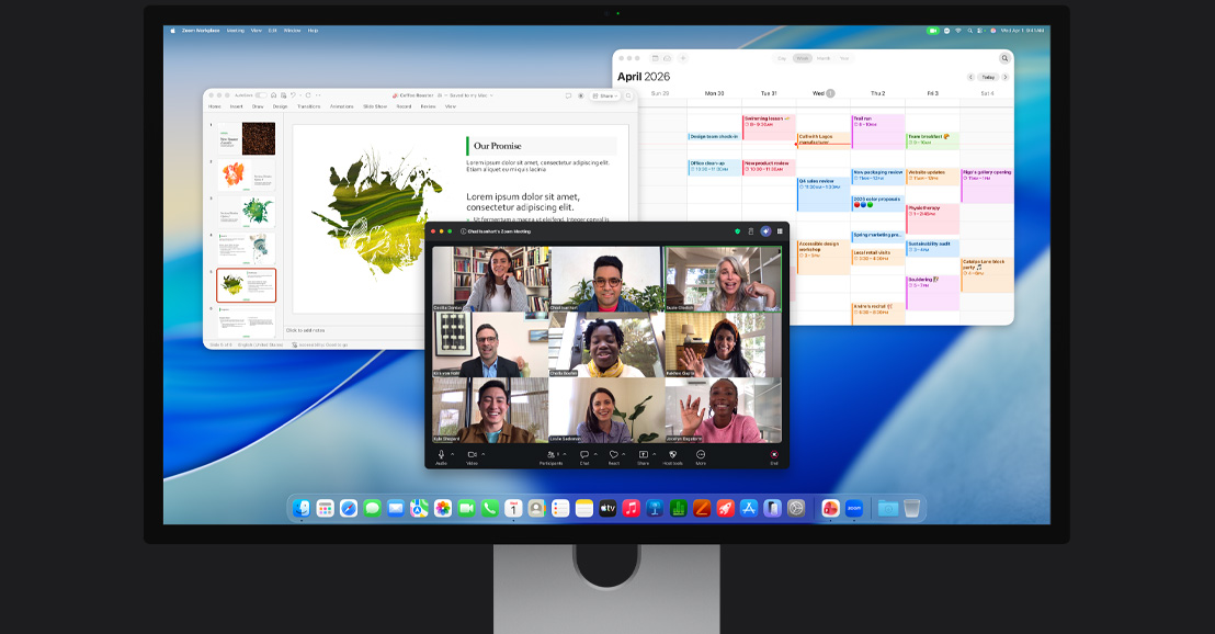 Una iMac, la pantalla muestra una videollamada de Zoom con varios participantes, un calendario y una presentación abiertos en segundo plano