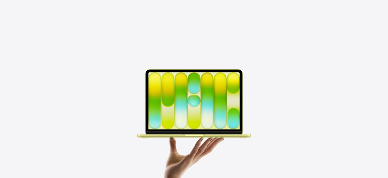 MacBook Neo en un brillante color amarillo cítrico, sostenida en equilibrio en la punta de los dedos de una mano abierta, la pantalla muestra un patrón abstracto y colorido