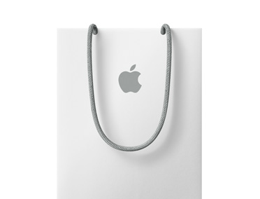 Üst kısma doğru Apple logosu olan beyaz renkte Apple alışveriş çantası