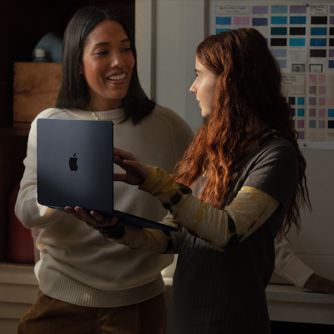 People using Mac in an education setting
