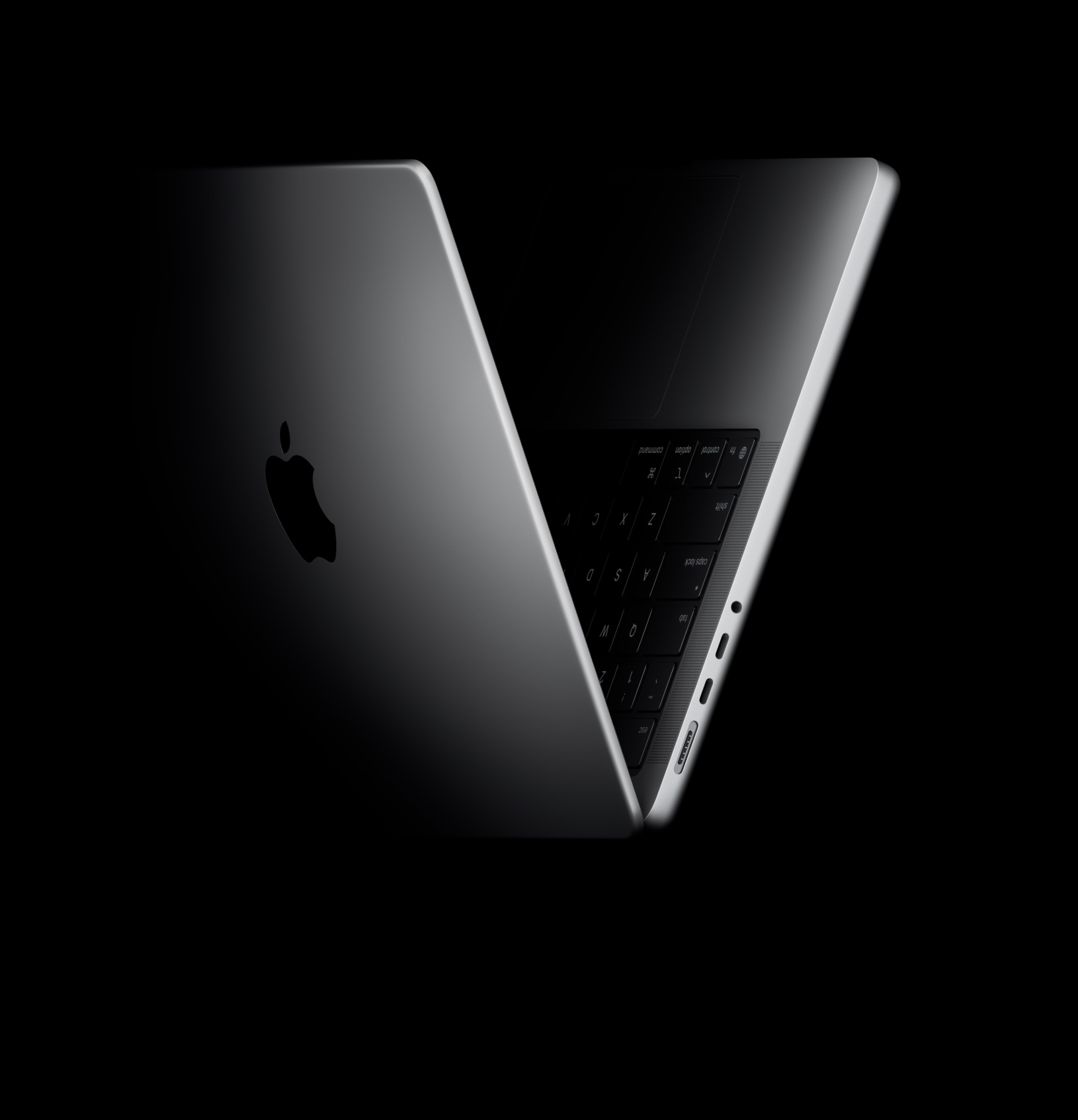 Animacija, kurioje „MacBook Pro“ sulenkiamas į V formą, pateikiant sąsają su M5 lustu